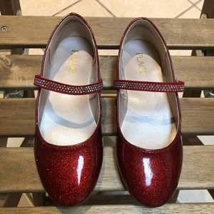 Girls red Christmas dress shoes.